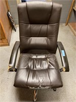 Brown office chair on wheels