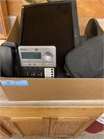 Box with office phone, Gateway computer monitor,