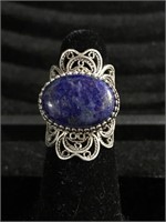 Sterling silver size 8 with blue stone marked DGS