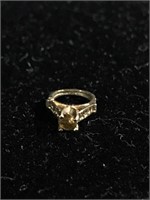 14k Yellow gold baby ring charm with brown Amber