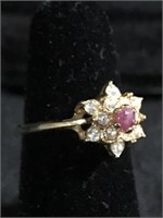 Size 8 ruby red stone with accent stones ring