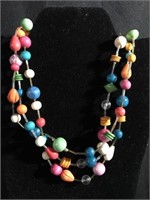 Multi colored wooden beaded necklace