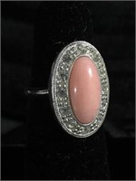 Peach colored stone with accent stones size 8
