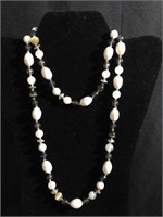 Brown and cream colored beaded necklace