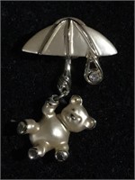 Bear with umbrella with raindrops brooch pin