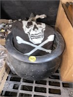 skeleton flag and plastic caldron