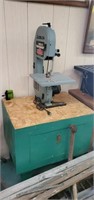 Delta bench band saw on a stand