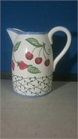 Nice pottery pitcher with cherries and