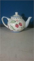 Teapot with cherries and strawberries