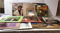 Christmas, country, and rock vinyl LP records