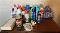 Large box of various cleaning supplies