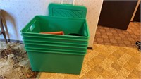 Three large Rubbermaid totes and two small