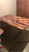 Retro dining room table with four chairs. Table