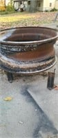 Steel fire pit ring made out of a rim.