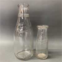 Pair of Reids Pasteurized Products Embossed Bottle