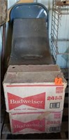 EMPTY BUDWEISER BOTTLES AND 2 CHAIRS