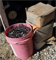 BUCKET FULL AND BOXES OF 16 P NAILS AND POLE BARN