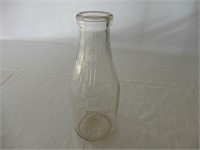 STORE K QUART EMBOSSED MILK BOTTLE