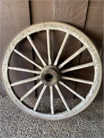 Antique wood and iron wagon wheel.  42”