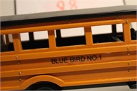 Blue bird wooden bus