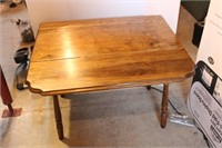 Drop leaf wooden table