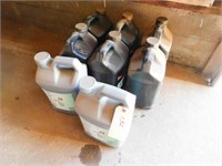 8- 2.5 gallon containers of hydraulic oil
