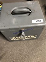 Skilsaw in metal case