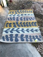 Camper area rug for outdoors (has wear)