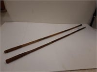 Two wooden gun cleaning rods