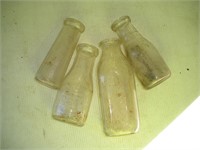 (4) Glass Milk Bottles   Tallest 9 Inches