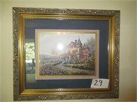gold frame print of Victorian house