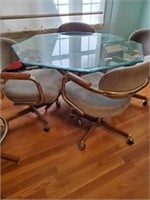 GLASS TOP TABLE AND ROLLING CHAIRS