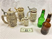 Collection of Vintage Beer Steins and Bottles
