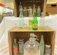 Selection of Vintage Bottles and Wood Crates