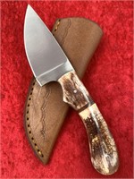 Skinning knife with bone scales, leather sheath, 7