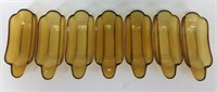 Lot of 7 amber glass butter dishes           (I 99