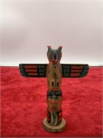 Hand carved and painted wood totem by Late Casper