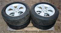 Set of 4 215/60R17 Tires on Jeep Rims