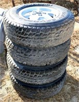 Set of 4 High Country 30X95/R15 Tires on Jeep Rims