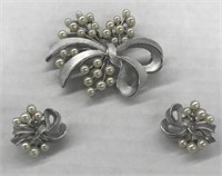 Crown Trifari brooch and clip on earring
