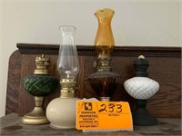 4 small oil lamps