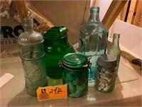 cheerwine bottle, sea shells, pitcher, bottles