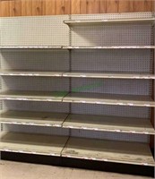 Grocery store style shelf unit, pegboard backing,