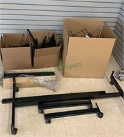 3 boxes of brackets and display holders, pieces