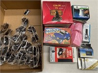 Box lot containing sunglasses and electronics