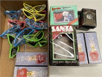 Box lot containing lamps, sunglasses, toys