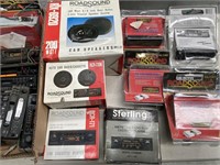 Box lot containing car stereos and speakers