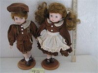 Boy & Girl Dolls on stands
