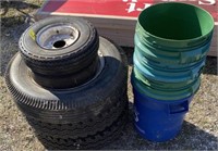 5 miscellaneous tires and 4 buckets