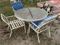 Outdoor patio set including 1 table 4 chairs